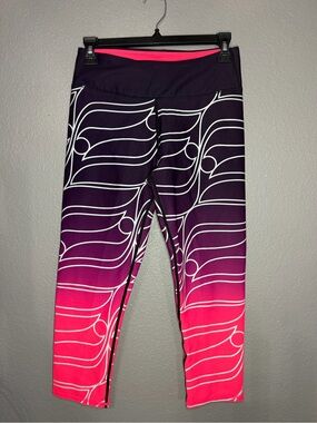Fabletics Ombre Pink to Purple Swim Leggings with White Wave Print